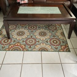 Coffee Table Very Heavy Table Baught From Ashley Store. Good Condition. I Have  No Room To Keep It. Brown Wood. Must Sell. Offer Me Reasonable Price.