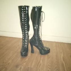 Black, Lace Up ,Go Go Boots With 5 Inch Heels. And Zipper On Side. 