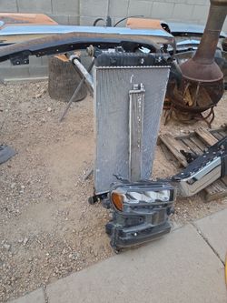 22021 Silverado  1500 radiation, trans cooler,it headlight