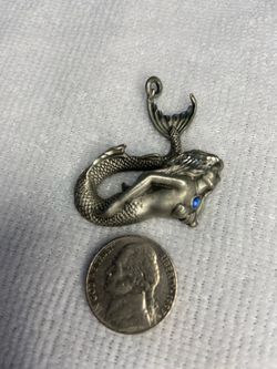 Vintage Mermaid pendant is a pewter type material
