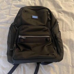 Tumi Black backpack,