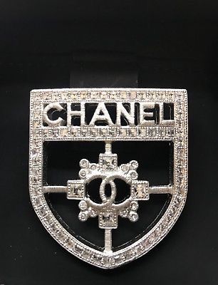 Chanel shield pin crystal rhinestone silver badge brooch CC logo+ a gift ๐ of Chanel Earrings