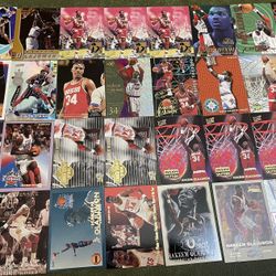 Lot of 39 NBA Hall of Famer Hakeem Olajuwon Basketball Cards