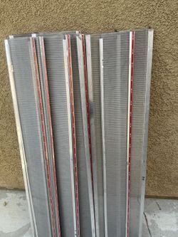 RAIN GUTTER - EASYON GUTTER PROTECTION COVERS ALL 20 FOR  40 DLS