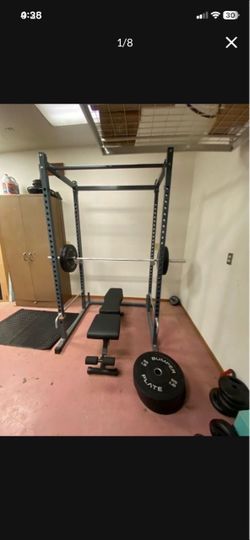 LOW PRICE MOVING- $2.5k VALUE BENCH PRESS WITH BRAND NEW FULL SET OF PLATES