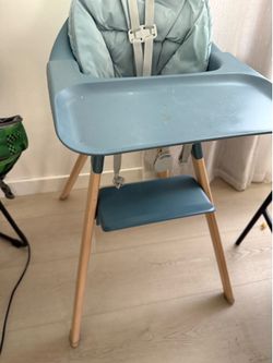 Stokke high chair with cushion seat insert