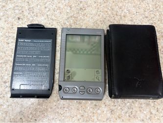 This device is a Handspring Visor, a PDA manufactured in the late 1990s to early https://offerup.com/redirect/?o=MjAwMHMuSXQ= runs the Palm OS operati