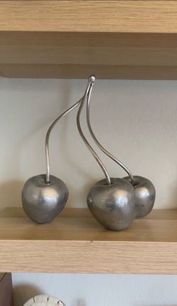 Silver cherry sculpture