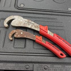 TWO HUSKY PIPE WRENCHES.