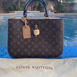 Louis Vuitton purse with straps