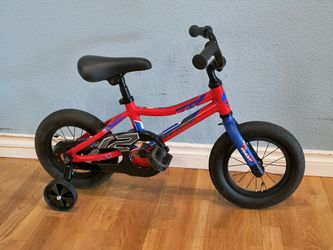 12" Giant  Animator kids BMX bike with aluminum frame with training wheels.