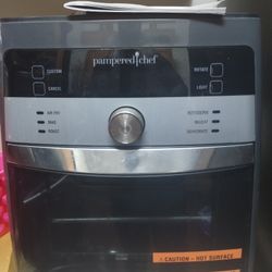 Includes functions for air fry, bake, roast, rotisserie, reheat, and dehydrate.