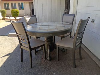 TABLE AND FOUR CHAIRS.