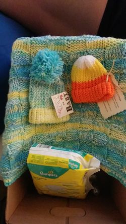 New born blankets also got n one pack of 27 preemie diapers