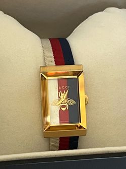Gold color Gucci watch