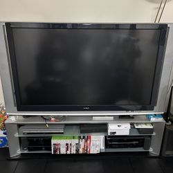 65 INCH SONY TV AND STAND $200