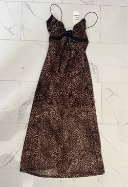 CHEETAH PRINT DRESS WITH/ DRAWSTRING CHEST (BRAND NEW) $40