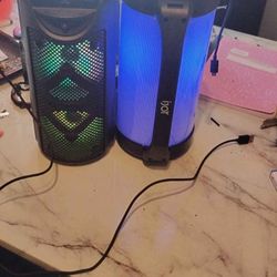 Two Bluetooth Speakers. 
