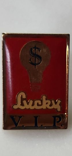 Antique enamel Lucky VIP lapel pin