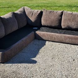 free brownish Gray couch sectional. no cushions. great for the dogs