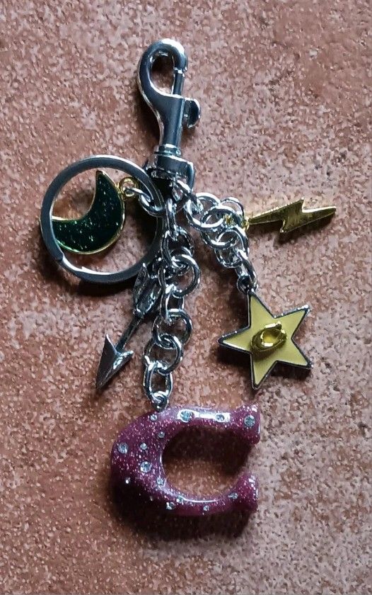 NEW WITHOUT TAGS, COACH SIGNATURE "C'S", STAR , LIGHTING BULTS, MOON KEYCHAIN