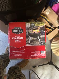 Portable charcoal grill