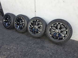 20" Chevy rims w/ used 275-55R20 tires
