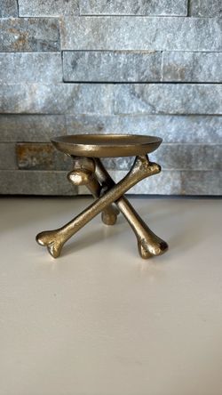 Gold bones candle holder