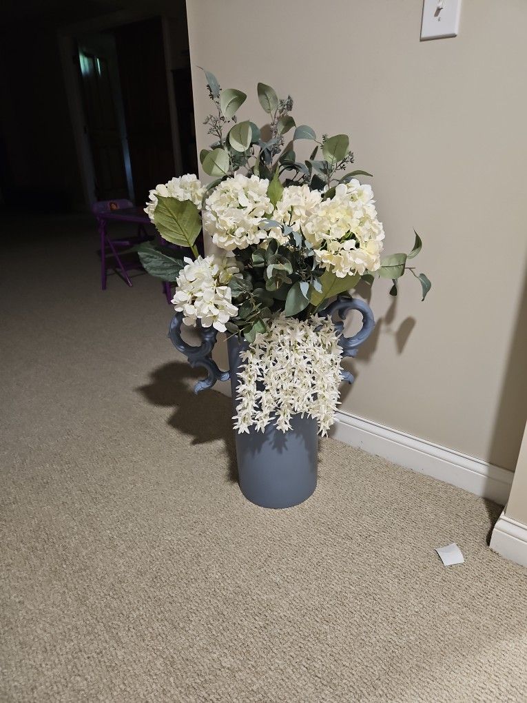 Blue Vase And Flowers