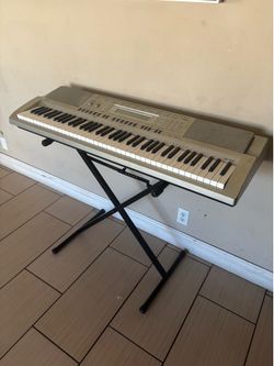 Casio Electric Keyboard With Stand