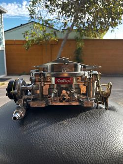 REBUILT EDELBROCK CARBURETOR
