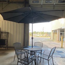 Brand New 6-Piece Patio Metal Dining Set with Umbrella – $199  Upgrade your outdoor space with this elegant 6-piece patio dining set – perfect for fam