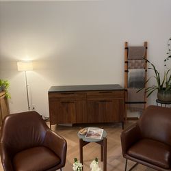 Room and Board Kenwood Walnut Storage Cabinet with marbled black ceramic top.