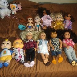 Barbie Dolls Of Fashions And Ature. Have Multipe Cloths  Including Hand Held Items.