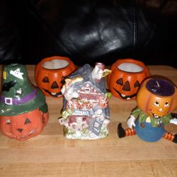 COLLECTION OF 5 NEW HALLOWEEN THEMED CANDLE HOLDERS, CANDLES.. 3 HALLOWEEN HAND PAINTED CERAMIC TEA LIGHT CANDLE HOLDERS & 2 PUMPKIN CANLDES
