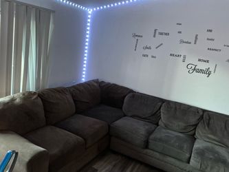 Brown couch still firm and good use.