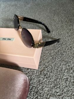 Miu Miu Round Women’s Sunglasses