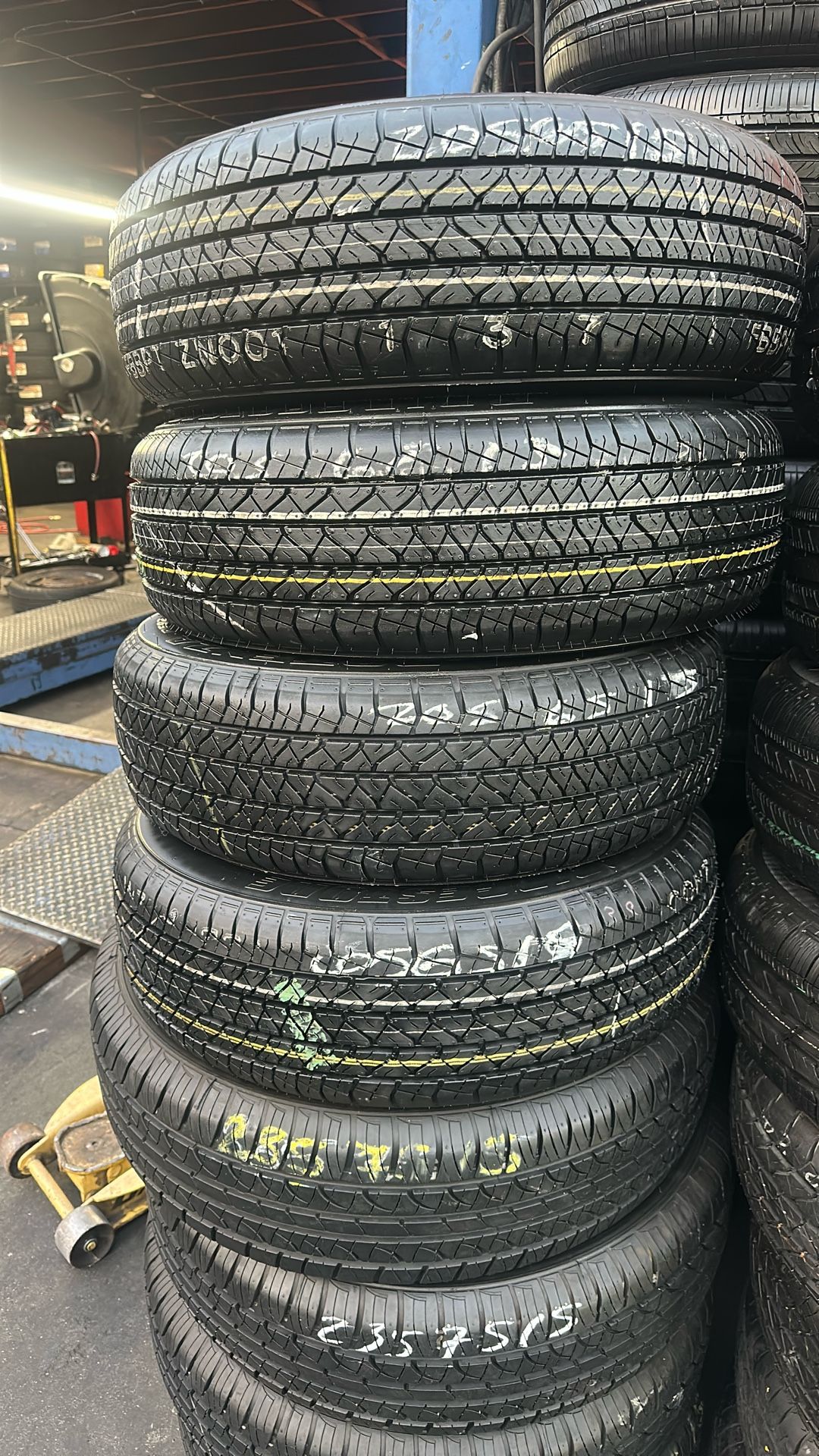 FOUR GOOD USED TIRES 205/65/15 BRIDGESTONE DULER $240