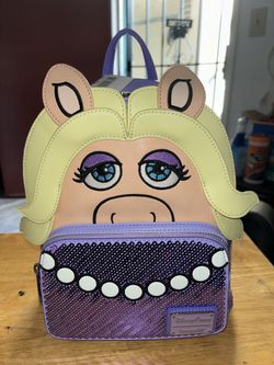 Several Loungefly Backpacks
