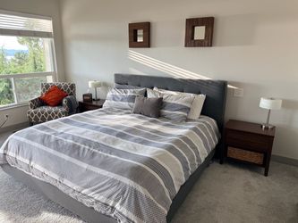 Crate & Barrel tall upholstered bed frame, mattress, 2 night stands,  lamps set, 5 pillows bundle.