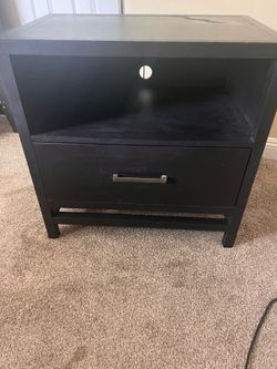 Small single drawer dresser with power cord