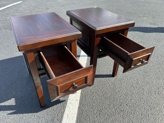 Pair of good dark wood end tables with drawers