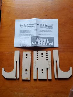 Guitar wall hanger