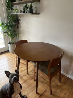 mid-century table with 3 matching chairs