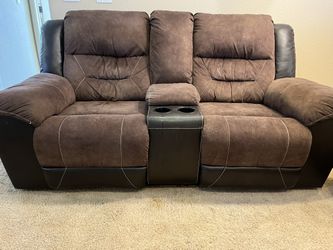 Reclining two seater sofa