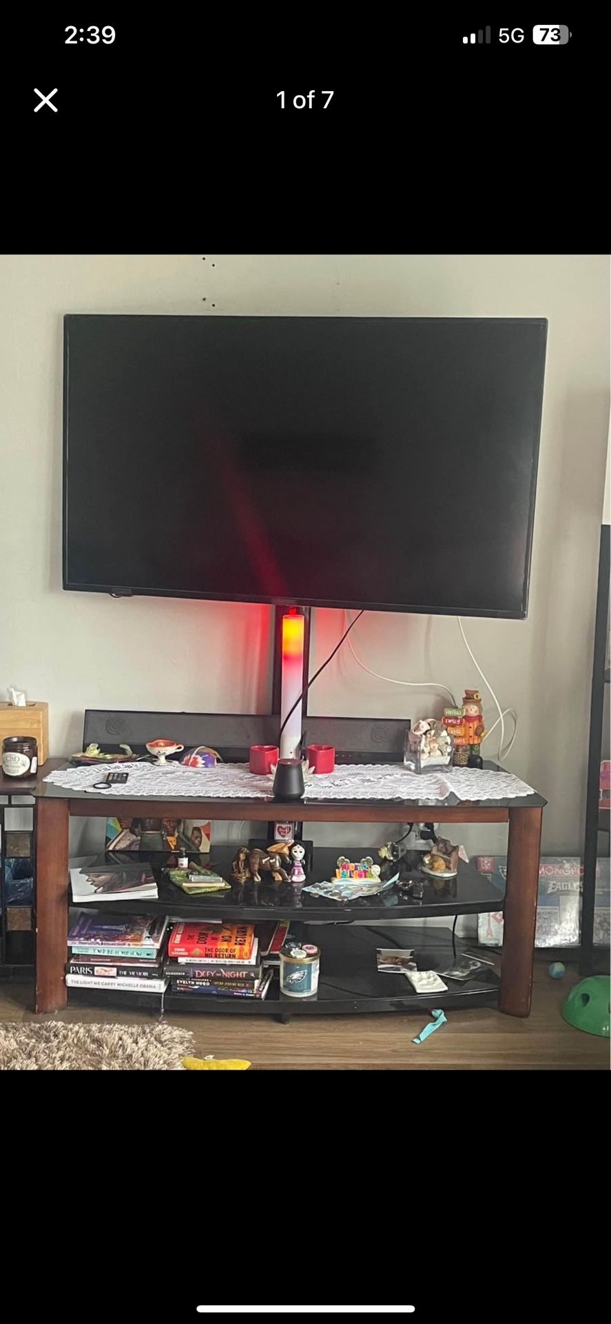 TV STAND W/ TV MOUNT BUILT IN, 3 black glass shelves (nothing 4 sale just tv stand)see pics $125 OBO HOLDS 55inch now