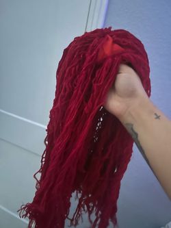 Red yarn wig