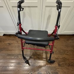 Walker with seat and compartment 