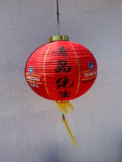 Chinese tradition hanging lanterns / sport Tsingtao pure draft beer