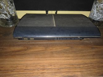 PS3 W/Remotes Anda Shit Ton Of Games 